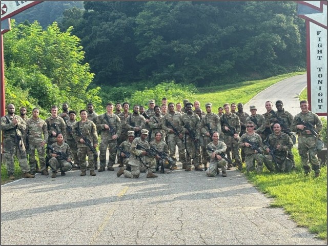 Members of Heavy Forward Support Troop, 2nd Squadron, 3d Cavalry Regiment pose for a Troop photo after completing a foot march at Camp Casey in the Republic of Korea in August 2024.