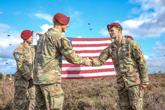Staff Sgt. David Cobb, Delta Company, 1st Battalion, 143rd Infantry Regiment (Airborne) reenlists at the Houtdorpveld drop zone during Falcon Leap, NATO's largest Airborne technical exercise, Sept. 16, 2021 in the Netherlands. CPT Michael Jones,...