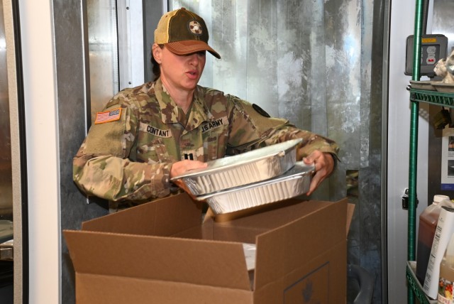Capt. Jacquelyn Contant, Chief, Nutrition Care Division, Keller Army Community Hospital, boxes frozen repurpose prepared and wholesome foods for donation to the Regional Food Bank of New York.