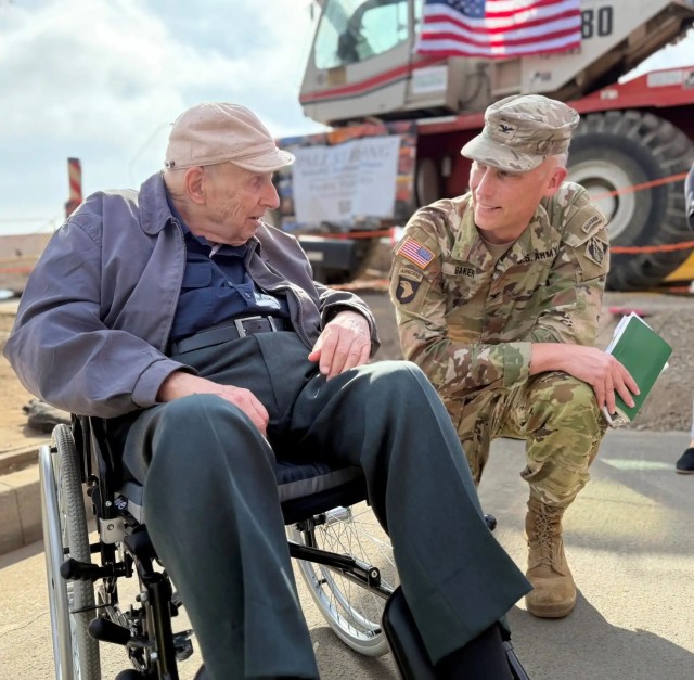 Col. Andrew Baker, commander of the U.S. Army Corps of Engineers Los Angeles District, right, talks with Noland West, whose property was the last opt-in private property slated for debris removal, during a milestone event Aug. 26 in the Pacific...
