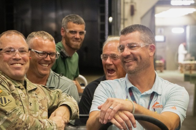 Cliff Voss, alongside his sons Clint and Lucas, tours the Rock Island Arsenal-Joint Manufacturing and Technology Center with former RIA-JMTC Commander Col. Dave Guida and current Deputy Commander Greg Lupton. This visit highlights the...