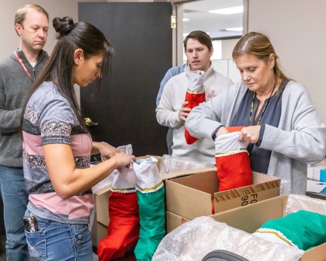 PICATINNY ARSENAL, N.J. - Approximately 30 Christmas stockings containing personal hygiene products, hats, gloves, snacks, and handwritten notes were shipped to the U.S. Special Operations Forces currently deployed overseas earlier this month....