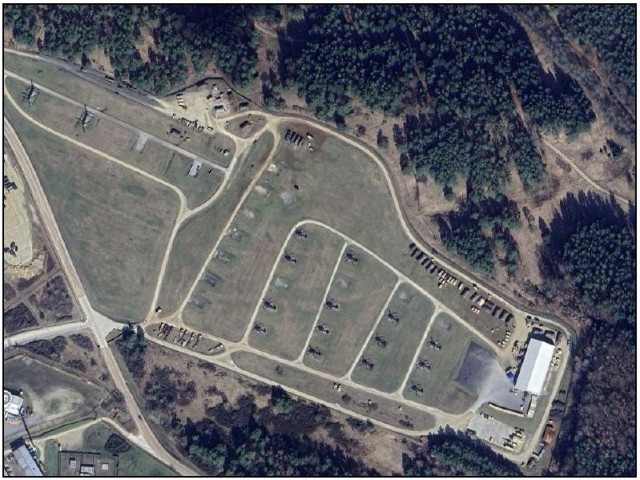 Figure 2. Satellite imagery of &#34;40S&#34; shows a Division Support Area with clearly identifiable aircraft, ground support equipment, and command posts.