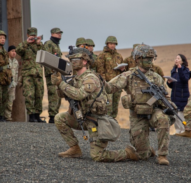 U.S. Army soldiers assigned to Alpha Company, 2nd Battalion, 3rd Infantry Regiment, 1st Stryker Brigade Combat Team, 7th Infantry Division, demonstrate counter-drone tactics for Japan Ground Self-Defense Force soldiers from the 22nd Rapid...