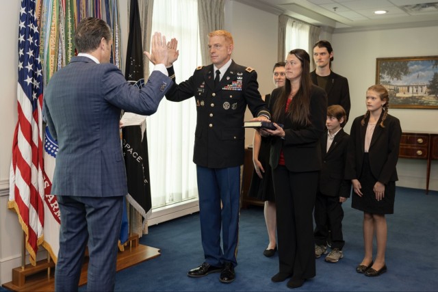 Secretary of War Pete Hegseth administering the oath of office to U.S. Army Col. Kevin Bouren, formally returning Bouren to active duty, on October 2, 2025, at the Pentagon. The event concluded his three-year separation from the service, a period...