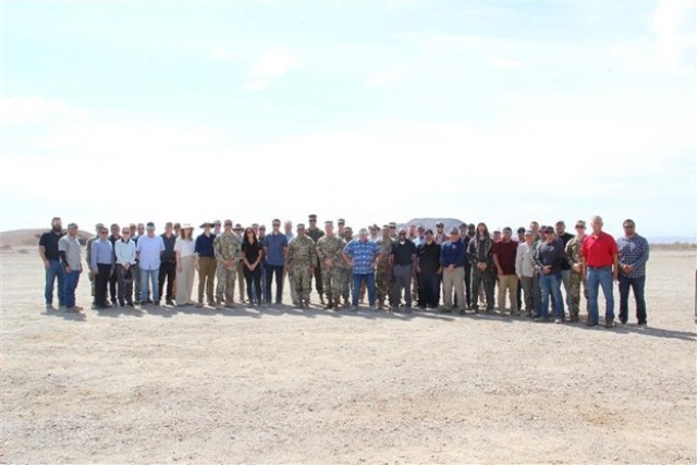 Product Manager Medium Caliber – Project Manager Maneuver Ammunition Systems team at Yuma Proving Grounds after successful testing of the XM1228 BADGER. Photo by U.S. Army.