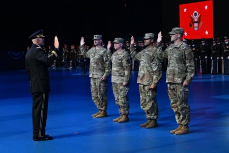 Army Chief of Staff Gen. Randy A. George administers the Oath of Office to four new U.S. Army Lt. Cols. during a Detachment 201: The Army’s Executive Innovation Corps (EIC) commissioning ceremony in Conmy Hall, Joint Base Myer-...