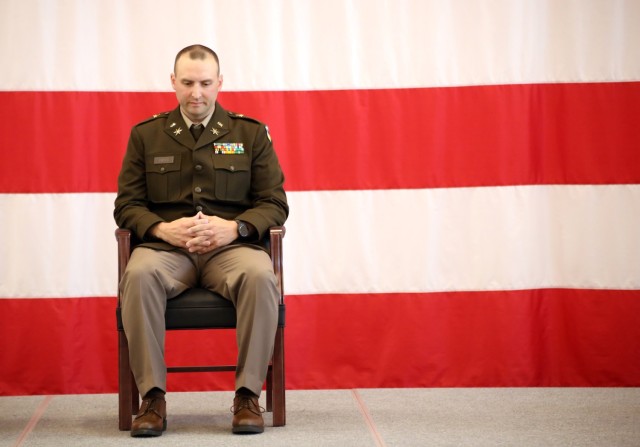 Capt. William Fritts, a Cyber Warfare Officer, Washington Army National Guard sits prior to his commissioning ceremony on June 2, 2025, at the Pierce County Readiness Center, Camp Murray, Wash. Fritts earned the rank of Captain through the...