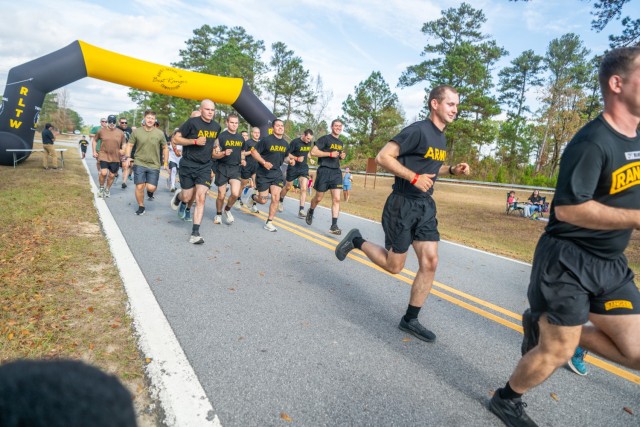 Soldiers and families run a 5k honoring the 75th anniversary of the Ranger Course, Nov. 2, 2025, on Camp Rogers at Fort Benning, Georgia. (U.S. Army photo by Patrick A. Albright)