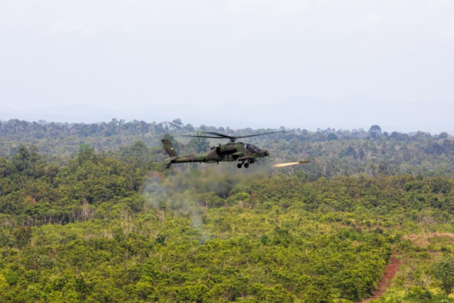 U.S. Army AH-64E Apache Guardian helicopter pilots assigned to the 16th Combat Aviation Brigade, 4-6 Air Cavalry Squadron, Joint Base Lewis-McChord, Washington, fire rockets at a joint strike live fire exercise during Super Garuda Shield 25 in...