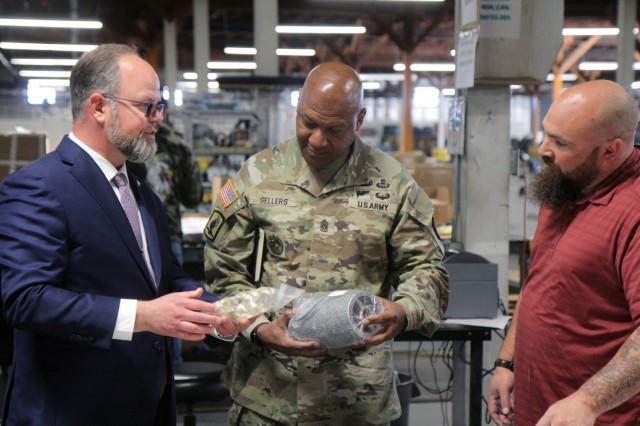 Jon Hunter (left), Sierra Army Depot chief of staff and Jason Tong (right), Sierra Army Depot supply support activity director, shows Command Sgt. Maj. Jimmy Sellers, U.S. Army Materiel Command senior enlisted advisor, Sierra Army Depot's...