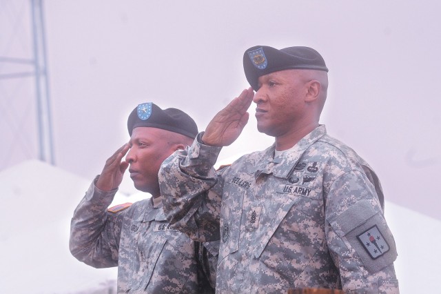 Brig. Gen. Ronald Kirklin, Quartermaster General, and Command Sgt. Maj. Jimmy Sellers, Quartermaster Regimental CSM, salute during the playing of the National Anthem during the Quartermaster Regimental Review June 5 at Seay Field.