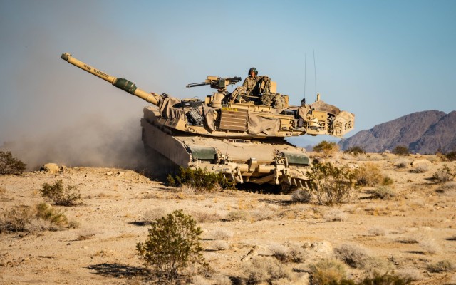 First Team Troopers assigned to 1st Battalion, 8th Cavalry Regiment, 2nd Armored Combat Brigade, 1st Cavalry Division, maneuver an M1A2 SEPv3 during rotation 26-02 at the National Training Center, Fort Irwin, California, Nov. 4, 2025. The rotation...