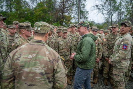 Graduates of Ranger Class 01-26 speak with Secretary of the Army Daniel P. Driscoll moments before receiving their Ranger tabs at Victory Pond on Fort Benning, Georgia, Dec. 5, 2025.