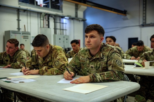 Soldiers complete a vehicle identification exam during the U.S. Army Europe and Africa Best Drone Warfighter Competition at the Grafenwoehr Training Area, Germany, Dec. 8, 2025. The competition reinforces the Army&#39;s commitment to innovation and readiness, while also building esprit de corps and camaraderie.