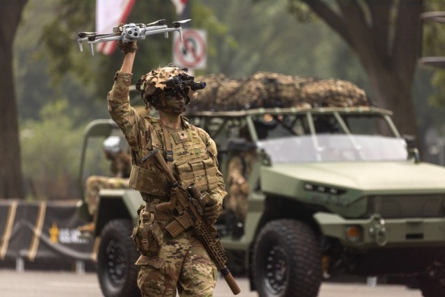 A Soldier assigned to the 101st Airborne Division (Air Assault) raises a drone during the Army’s 250th birthday parade in Washington, D.C., June 14, 2025. The demonstration showcased emerging capabilities including next-generation squad weapons,...