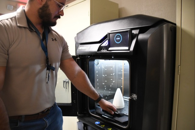 Dillion Mann shows how Yuma Test Center’s Metrology and Simulation Division utilize 3-Dimensional (3D) printers to support the test mission by being able to print parts on demand. Metrology Branch Chief Savanna Silva stressed that the 3D...