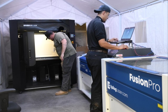Yuma Test Center’s Metrology and Simulation Division recently purchased two 3-Dimensional printers that provide a larger printing capacity and eight different materials, including carbon fiber. AJ Martin and Brendan Denney are pictured operating...