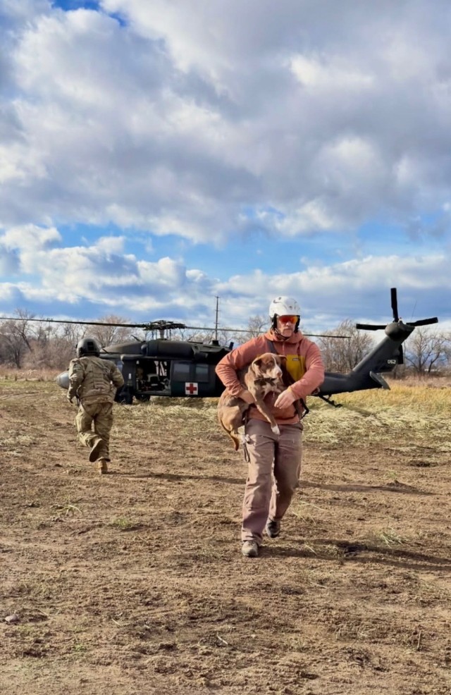 A UH-60M Black Hawk helicopter crew from the U.S. Army Air Ambulance Detachment–Yakima, 2nd Battalion, 158th Aviation Regiment, 16th Combat Aviation Brigade, assisted with flood evacuations in Yakima County, Wash., on Dec. 9, 2025. The crew...