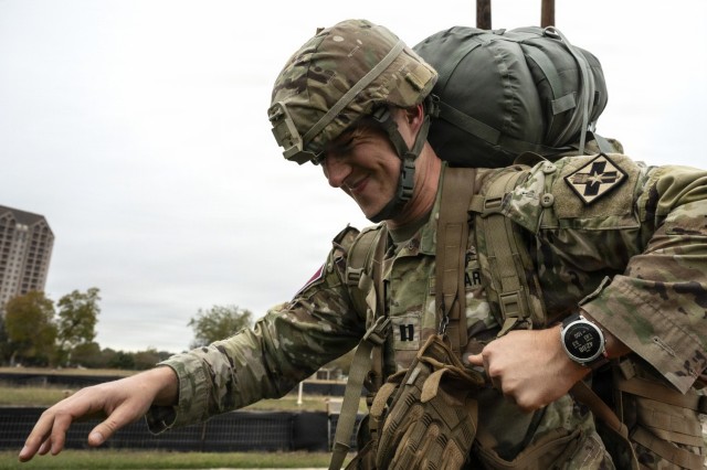 U.S. Army Capt. Thomas Garcia, 187th Medical Battalion Basic Officer Leader Course instructor, adjusts his ruck pack for the buddy run test during the U.S. Army Medical Center of Excellence Best Medic Competition on Fort Sam Houston, Texas, Dec....