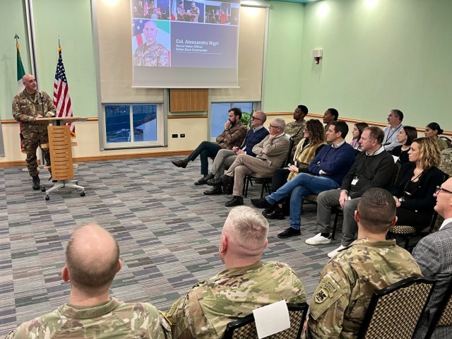 Col. Alessandro Nigri, the new Italian Base Commander, introduces himself to U.S. and Italian leaders at the Dec. 3, 2025 Mayors' Summit, held at Caserma Ederle.