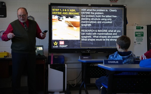 WILMINGTON, N.C. (Dec. 10, 2024) — Ray Mullins, P.E., chief of the Asset Management Branch, Wilmington District, U.S. Army Corps of Engineers, speaks to fifth-grade students about the education and career path required to become a professional...