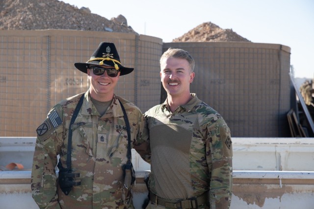 U.S. Army 1st Sgt. Devon Nier, first sergeant of Alpha Troop, 6th Squadron, 17th Cavalry Regiment, Task Force Nighthawk and U.S. Army Capt. Connor Fischer, battle captain and operations representative for 6th Squadron, 17th Cavalry Regiment, Task...