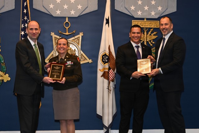 Representatives of U.S. Army Garrison Hawaii, the Hawaii Department of transportation, and the State of Hawaii Emergency Management Agency receive the Army Community Partnership Award during a ceremony at the Pentagon, Arlington, Virginia, Dec. 9,...