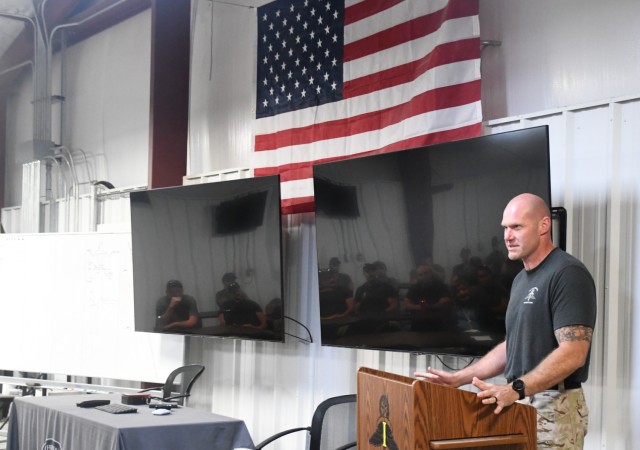 Zachary Achziger at podium