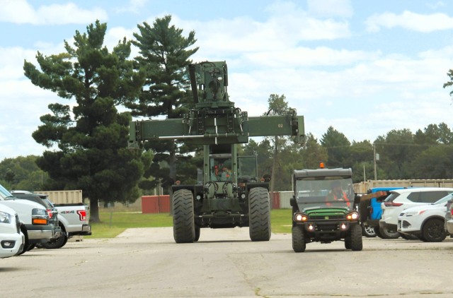 An employee with Regional Training Site-Medical operates a Rough Terrain Container Handler to move cargo to a site in the training site’s complex Sept. 4, 2025, at Fort McCoy, Wis. RTS-Medical at Fort McCoy is one of three regional training...