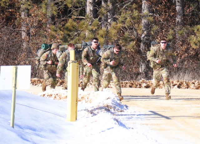 ROTC cadets compete in the Northern Warfare Challenge on Feb. 21, 2025, at Fort McCoy, Wis. ROTC teams with U.S. Army Cadet Command came from all around the United States as they battled through a wide variety of challenges and long ruck marching...