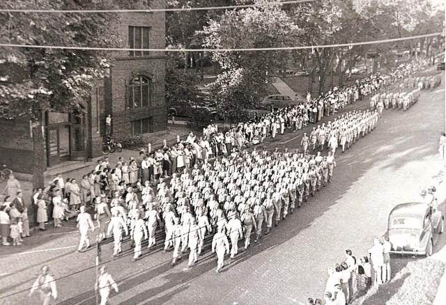 Soldiers from then-Camp McCoy, Wis., participate in a parade for War Salvage Day in 1943 in La Crosse, Wis. Local history also describes how La Crosse participated in national “Salvage for Victory” campaigns during 1943, with specific...