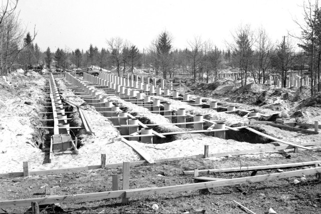 Construction of the cantonment area at Camp McCoy, Wis., is shown in 1942. More than 1,400 buildings were constructed in less than nine months in 1942 at McCoy. (U.S. Army Historical Photo)