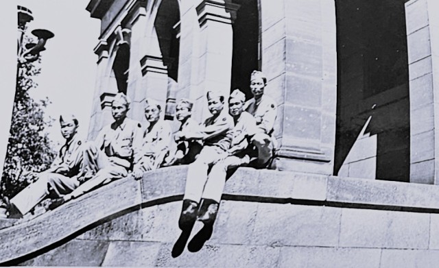 Japanese-American Soldiers pose for a group photo in front of a courthouse in La Crosse, Wis. in 1944. The Soldiers were connected to then Camp McCoy, Wis. The 133rd Infantry Regiment of the 34th Division had Nisei Soldiers from the 100th Infantry...