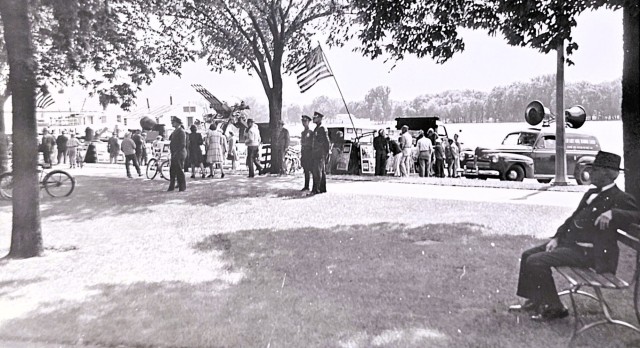 This shows a scene in La Crosse, Wis., in 1944 where the U.S. Army set up public displays of captured Japanese army equipment as part of an event for War Salvage Day in La Crosse and supported by Soldiers from Camp McCoy, Wis. (U.S. Army...