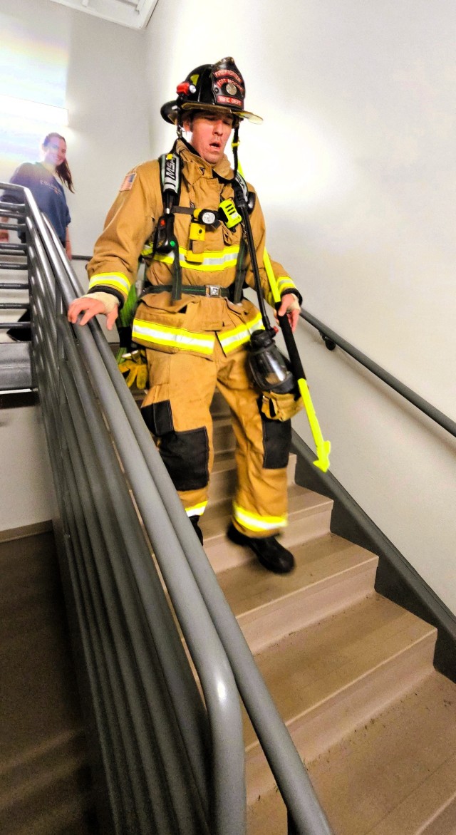 A firefighter with the Fort McCoy Directorate of Emergency Services Fire Department, Brandon Perron, participates in a 9/11 Memorial Run & Stair Climb hosted on Fort McCoy, Wis., on Sept. 11, 2025. The run is in honor of 2,975 civilians, Soldiers,...