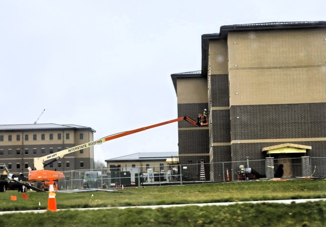 Contractors work on power lines Dec. 11, 2025, on the cantonment area at Fort McCoy, Wis. The work is part of an ongoing electrical grid upgrade at the installation where the post will go from a from a Delta Electrical System to a Wye Electrical...