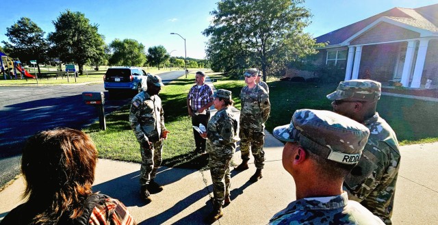 Members of the U.S. Army Garrison-Fort McCoy command staff and other garrison members participate in a “walking town hall” event Sept. 24, 2025, at Fort McCoy, Wis. The town hall allowed for Fort McCoy leaders to meet directly with...