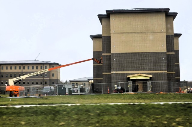 Contractors work on power lines Dec. 11, 2025, on the cantonment area at Fort McCoy, Wis. The work is part of an ongoing electrical grid upgrade at the installation where the post will go from a from a Delta Electrical System to a Wye Electrical...
