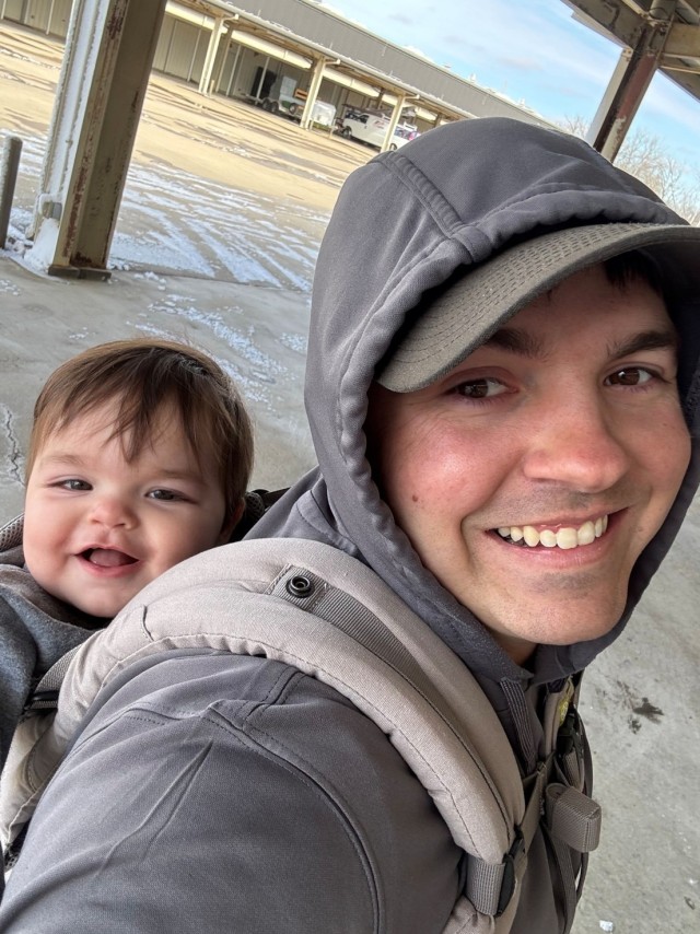 Sgt. First Class Alexander Miller and his son (Mason) spend time volunteering at the Fort Knox Red Cross Warrior Warehouse. (Photo provided by the Sgt. First Class Alexander Miller)