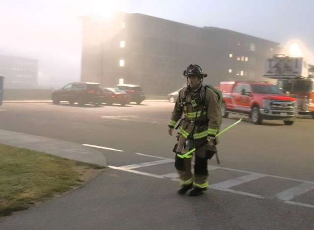 A firefighter with the Fort McCoy Directorate of Emergency Services Fire Department, Brandon Perron, participates in a 9/11 Memorial Run & Stair Climb hosted on Fort McCoy, Wis., on Sept. 11, 2025. The run is in honor of 2,975 civilians, Soldiers,...