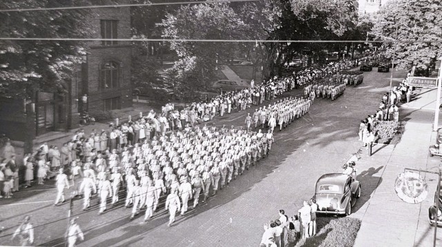 Soldiers from then-Camp McCoy, Wis., participate in a parade for War Salvage Day in 1943 in La Crosse, Wis. Local history also describes how La Crosse participated in national “Salvage for Victory” campaigns during 1943, with specific...