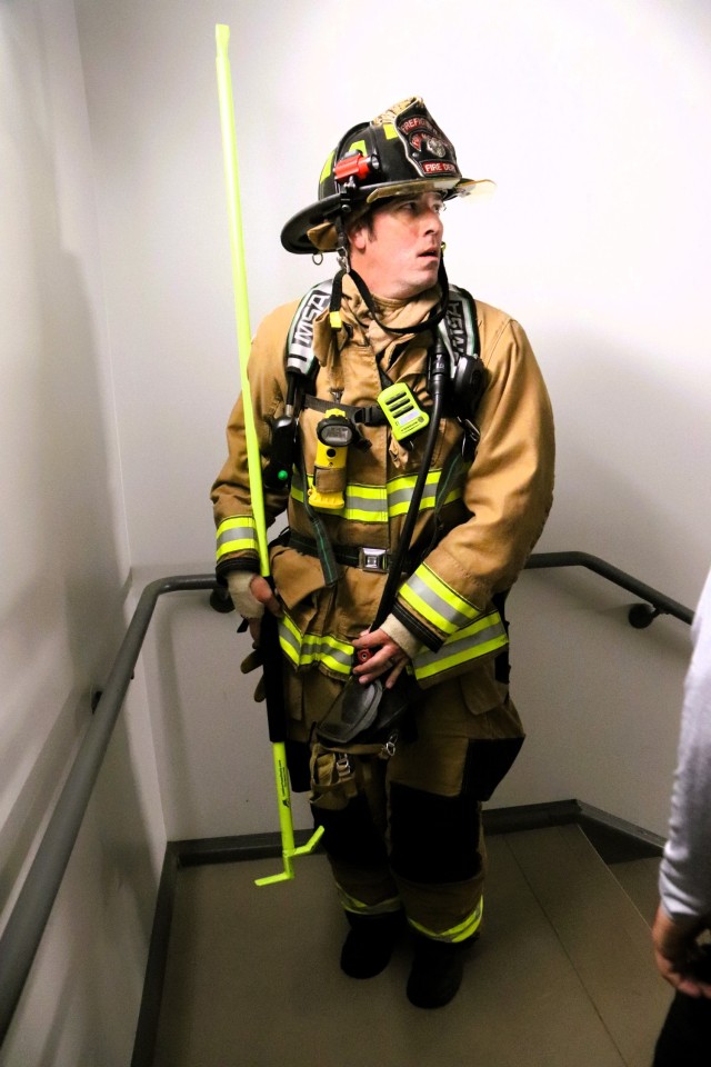 A firefighter with the Fort McCoy Directorate of Emergency Services Fire Department, Brandon Perron, participates in a 9/11 Memorial Run & Stair Climb hosted on Fort McCoy, Wis., on Sept. 11, 2025. The run is in honor of 2,975 civilians, Soldiers,...