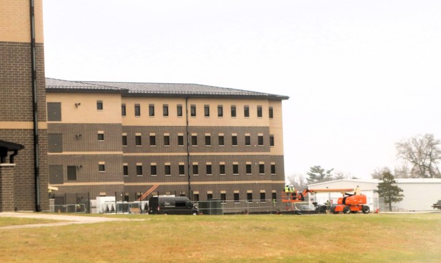 Contractors work on power lines Dec. 11, 2025, on the cantonment area at Fort McCoy, Wis. The work is part of an ongoing electrical grid upgrade at the installation where the post will go from a from a Delta Electrical System to a Wye Electrical...