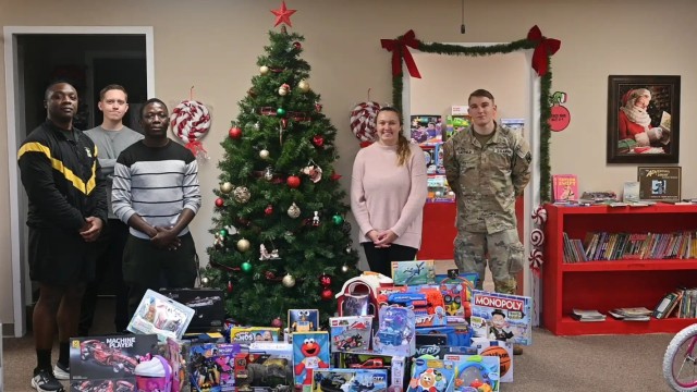 U.S. Army Soldiers with the 199th Infantry Brigade deliver toys to Santa’s Castle at Fort Benning, Georgia, Nov. 24, 2025. The brigade collected the donations during a holiday 5K run to support the nonprofit organization's mission of...