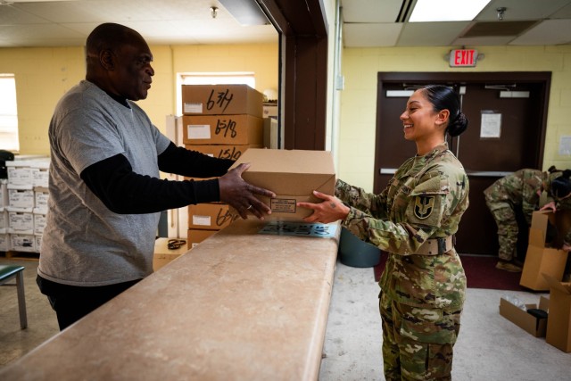 U.S. Army Staff Sgt. Vanessa Ortiz, a Drill Sergeant Leader assigned to the U.S. Army Drill Sergeant Academy, receives a campaign hat at Fort Jackson, S.C., Nov. 24, 2025. The campaign hat will become the official Drill Sergeant hat for females...