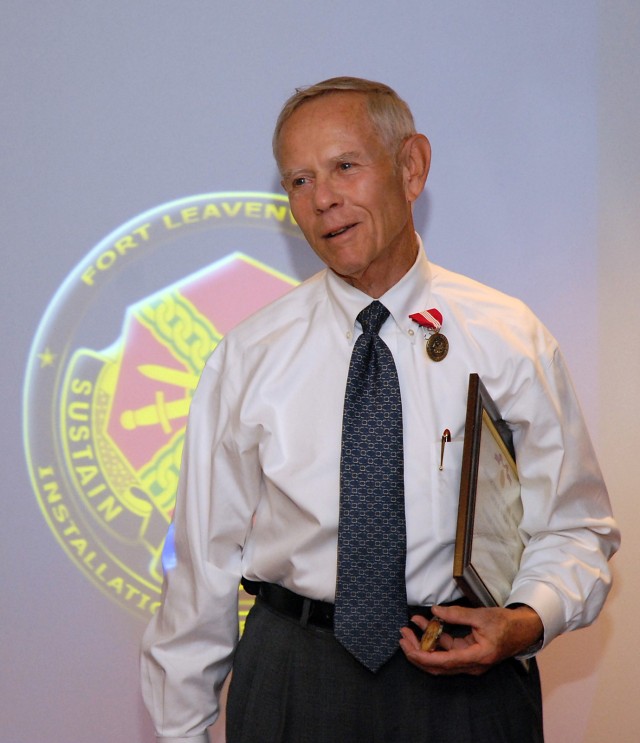 Deputy to the Fort Leavenworth Garrison Commander Jack Walker was awarded a Superior Civilian Service Medal in the Installation Base Operations Center Sept. 1, 2009, when Lt. Gen. William B. Caldwell IV, commander of the Combined Arms Center and...