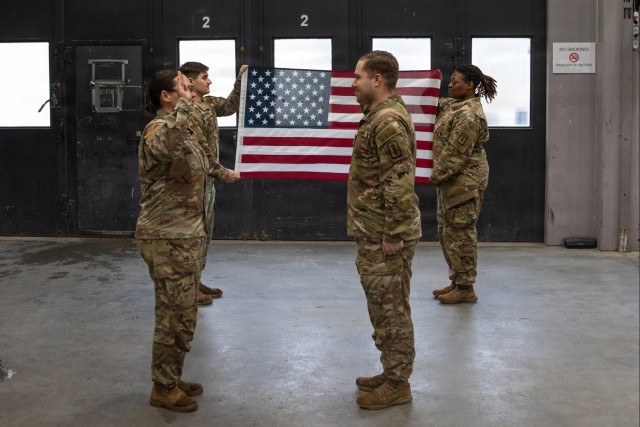Newly Promoted Captain Administers Oath to Fellow Officer at 30th Medical Brigade Ceremony