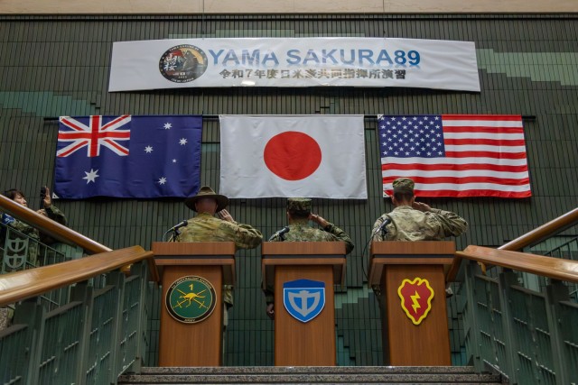 LTG Makoto Endo, Commanding General of Middle Army, Japan Ground Self-Defense Force, MG James Bartholomees, Commanding General of the 25th Infantry Division, and BG Shane Gabriel, Deputy Commanding General of 1st (Australia) Division, salute their...