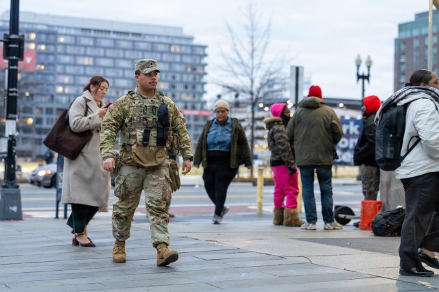 A Soldier assigned to the South Carolina National Guard stands watch in support of the D.C. safe and beautiful mission near the Navy Yard in Washington, Jan. 16, 2026. National Guard members provide a visible presence and work in coordination with...